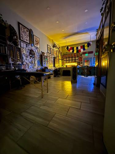 Inside High Tide Tattoo with flash art on the walls